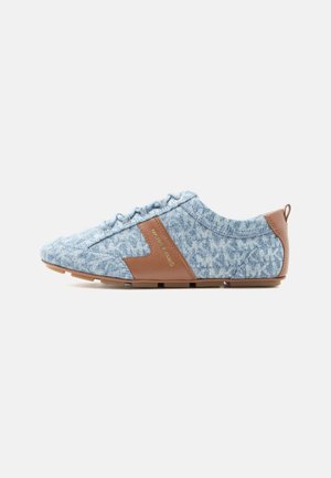 Light blue and brown casual sneaker with lace-up front, textured fabric upper, and "Michael Kors" logo on side panel.