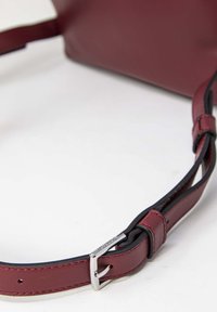 Calvin Klein RE-LOCK ROUND - Sac à dos - bordeaux