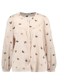 Blusa button-up beige chiaro con maniche lunghe, caratterizzata da vari farfalle ricamate in nero, arancione e teal su un tessuto testurizzato.