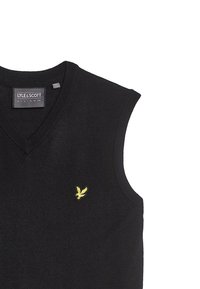 Maglione senza maniche nero lavorato a maglia con design a V. Presenta un piccolo logo di un'aquila gialla sulla parte sinistra del petto. Texture morbida.