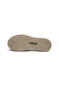 Suola della scarpa in gomma beige con un motivo testurizzato a onde e un accento del logo verde. Presenta un design flessibile per una migliore aderenza.