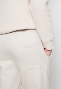 Pier One Calças de fato de treino - tan