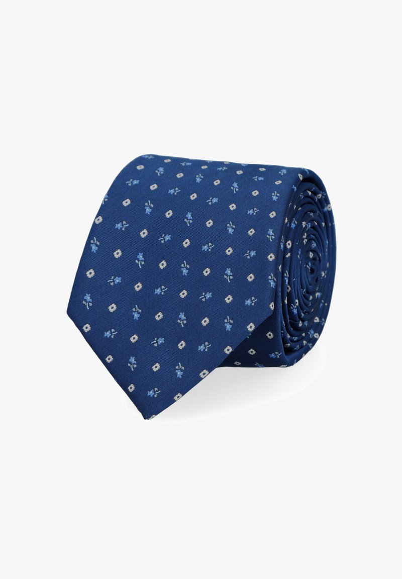 Granatowy krawat z wzorem małych białych kwiatków i niebieskimi akcentami. Wykonany z gładkiego materiału, w zwiniętej formie do przechowywania.