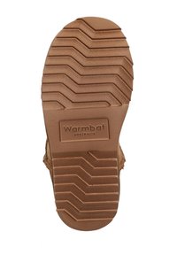 Bruine rubberen buitenzool met zigzagprofiel, gegraveerd "Warmbat Australia" logo, gestructureerd oppervlak bij de randen en een algehele duurzame uitstraling.