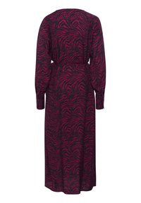 Long-sleeve, midi-length dress in burgundy with a black zebra print, featuring a waist tie and subtle textured fabric.