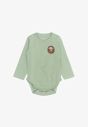 Langarm bodysuit van zachte groene katoen, met een gestikte leeuwen gezicht op de borst. Drukknopen op de schouder voor gemakkelijk aan- en uittrekken.