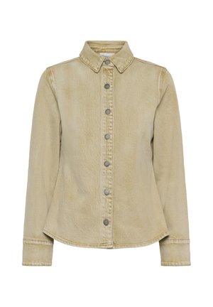 Lichtbeige spijkerjasje met lange mouwen, puntige kraag en metalen drukknopen aan de voorkant, licht taps toelopend bij de taille.