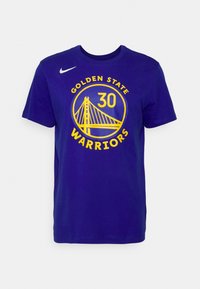 Fialové bavlněné tričko s kulatým výstřihem, které má žlutý grafický motiv mostu a text "GOLDEN STATE WARRIORS" v tučném písmu.