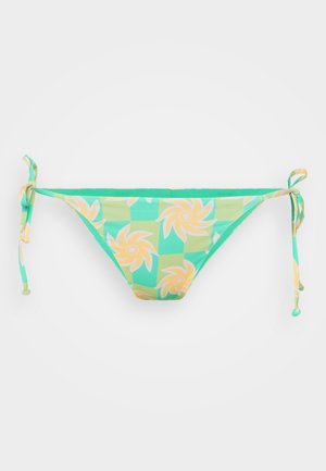 Bikini bottom in green fabric with yellow floral pattern. Features adjustable tie closures on both sides. Smooth texture.