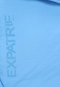 Expatrié POPPY - Handväska - blue