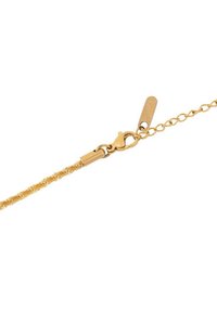 Gold-tone chain bracelet featuring a spiral design, lobster clasp, and extension chain with a small tag. Textured surface, lightweight construction.
