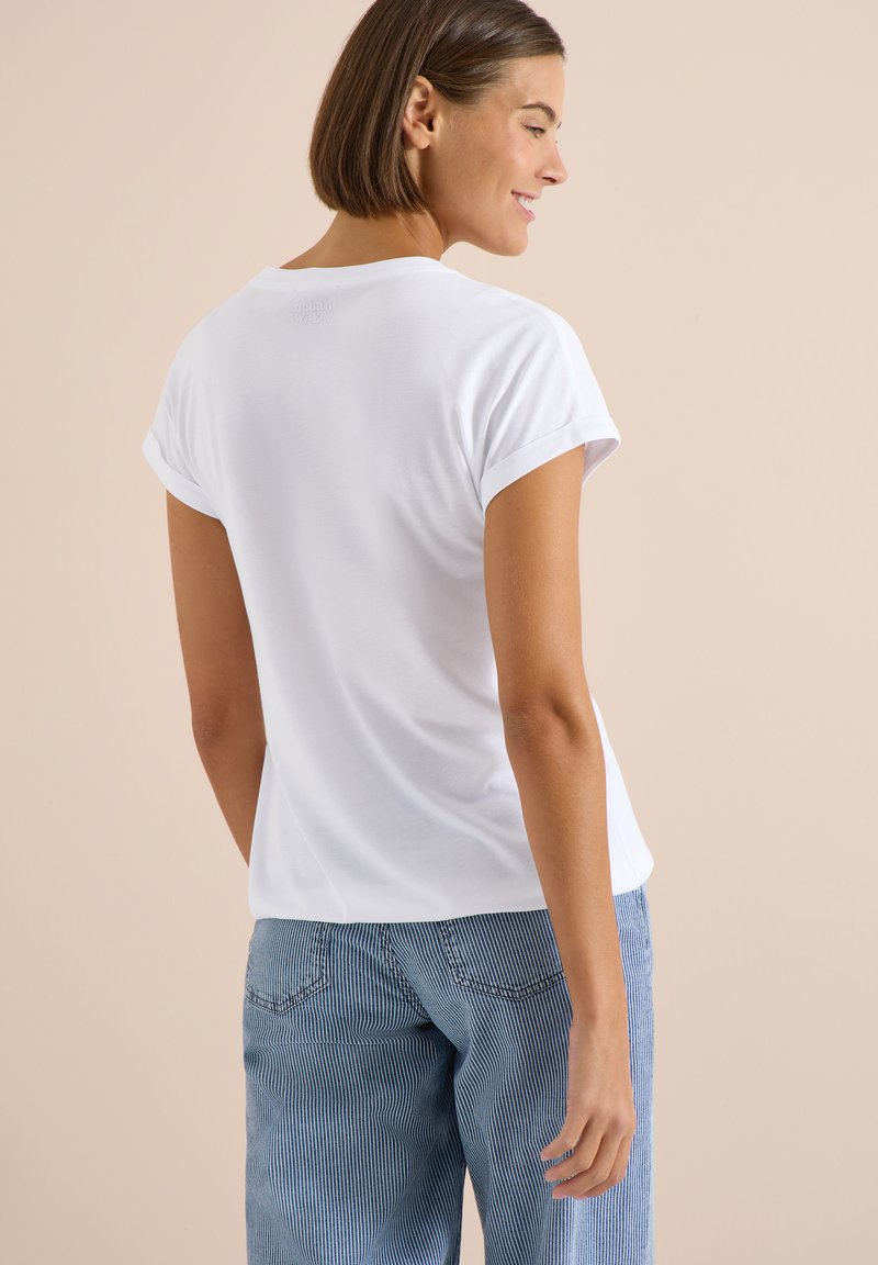 Maglia basic color crema a coste in cotone scollo a