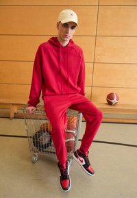 Jordan Kapuzenpullover - gym red/black