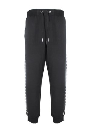 Pantaloni della tuta neri realizzati in un mix di cotone, con cintura elastica e cordini, tasche laterali e accenti bianchi del logo lungo le gambe.