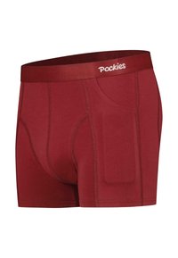 Boxers en marron uni. Dotés d'une taille logo, d'une poche latérale et d'accents de couture contrastés. Matériau doux et extensible.