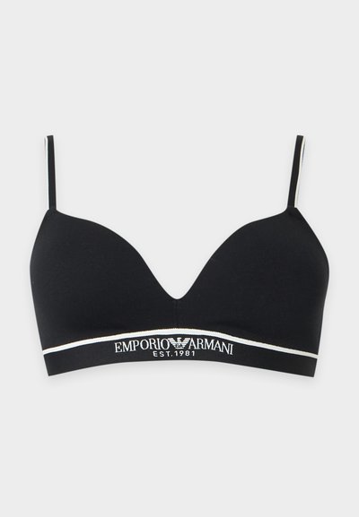 Μαύρο ασύρματο σουτιέν Emporio Armani με λεπτές ρυθμιζόμενες τιράντες και ελαστική ταινία με το εμπορικό σήμα στο κάτω μέρος με την ένδειξη "EMPORIO ARMANI EST. 1981."