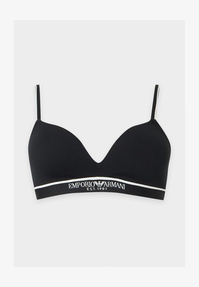 Μαύρο ασύρματο σουτιέν Emporio Armani με λεπτές ρυθμιζόμενες τιράντες και ελαστική ταινία με το εμπορικό σήμα στο κάτω μέρος με την ένδειξη "EMPORIO ARMANI EST. 1981."