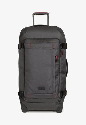 Wheeled Rucksack in schwarzem und grauem strukturiertem Stoff, ausgestattet mit einem ausziehbaren Griff, mehreren Reißverschlüssen und roten Akzenten. Kompaktes Design mit Seitentaschen.