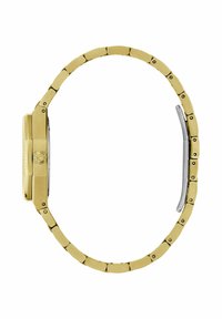 Vue latérale d'une montre-bracelet en métal doré avec un bracelet à maillons et une couronne texturée sur le boîtier de la montre.