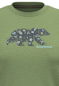 Groene katoenen sweatshirt met een berenontwerp gemaakt van blauwe en donkere bloempatronen. Inclusief het 'Smartwool.' logo in lichtblauw.