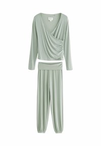 Ljusgrön lounge-set bestående av en långärmad omslagstopp med draperad front och matchande byxor med elastisk midja och avsmalnande mudd.