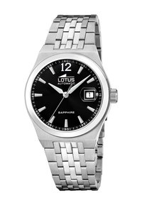 Montre automatique en acier inoxydable argenté avec un cadran noir, des index horaires blancs, et affichage de la date à 3 heures. Verre saphir.