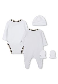 White baby outfit set with long sleeves, includes a bodysuit, knitted hat, and mittens. Features black and gold trim and textured fabric.