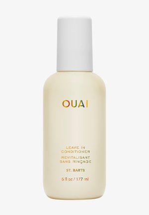 Bouteille blanche d'après-shampoing sans rinçage OUAI St. Barts avec bouchon blanc, 6 onces liquides ou 177 millilitres, étiquette avant visible.