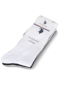 Three-pack of U.S. Polo Assn. white crew socks with black logo embroidery and packaging showing brand and size 39/42.