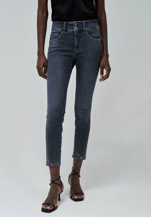 Vaqueros pitillo - grau