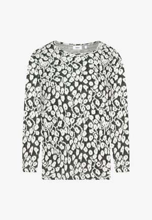 Langärmliges Oberteil in Schwarz und Weiß mit gepunktetem Muster, Rundhalsausschnitt und weicher Textur. Hergestellt aus Strickstoff mit lockerem Schnitt.