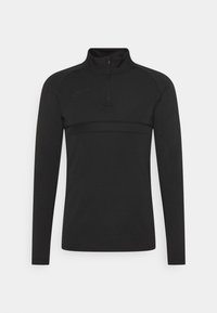 Schwarzes Nike Langarm-Sportoberteil mit halbem Reißverschluss, strukturiertem Einsatz über der Brust und kleinem Logo auf der oberen linken Seite.