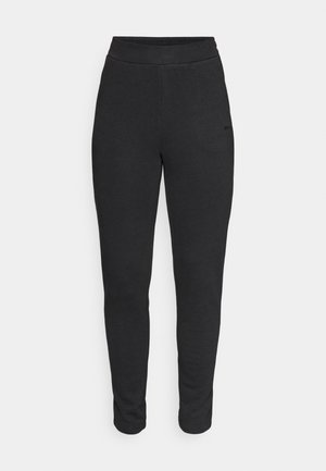 Sorte joggebukser med glatt tekstur, elastisk midje og smale ben. Ingen synlige mønstre eller detaljer. Enkelt design.