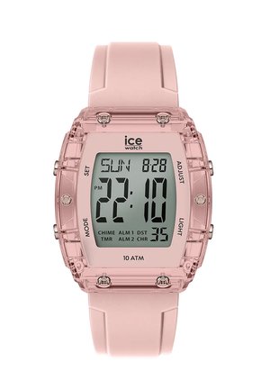 Montre numérique avec un boîtier en plastique transparent rose et un bracelet en silicone rose doux. Elle possède un écran LCD carré, des boutons sur le côté et est résistante à l'eau.