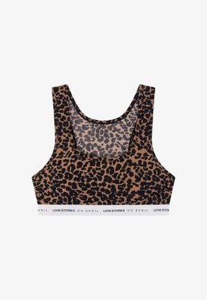 Bralette en imprimé léopard avec un décolleté arrondi, une conception dos nageur, et une bande élastique blanche arborant le logo de la marque, fabriqué à partir d'un tissu doux.