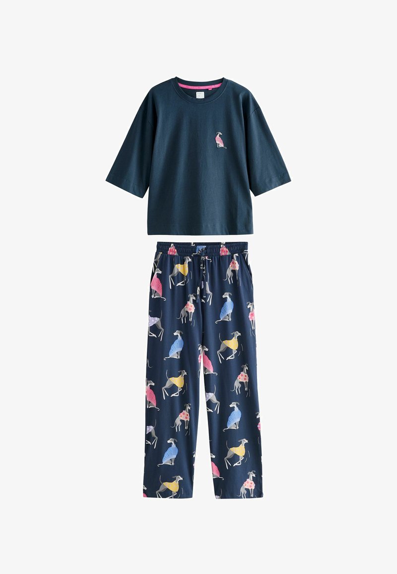 Conjunto de pijama azul marino que incluye una camiseta de manga corta con un diseño de perro y pantalones estampados con ilustraciones de perros coloridos y divertidos.