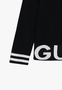 Guess JUNIOR CUT OUT - Stickad tröja - jet black