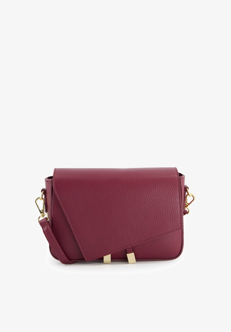 Burgundy leather crossbody bag with textured finish, angular flap, gold hardware, and decorative accents at the base. Adjustable strap included.