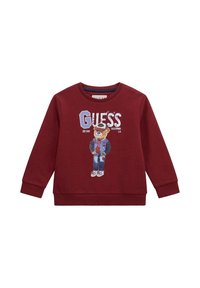 Felpa bordeaux con maniche lunghe, polsini e scollatura a coste; presenta una grafica di un orso che indossa un giubbotto, accompagnata dal testo "GUESS".