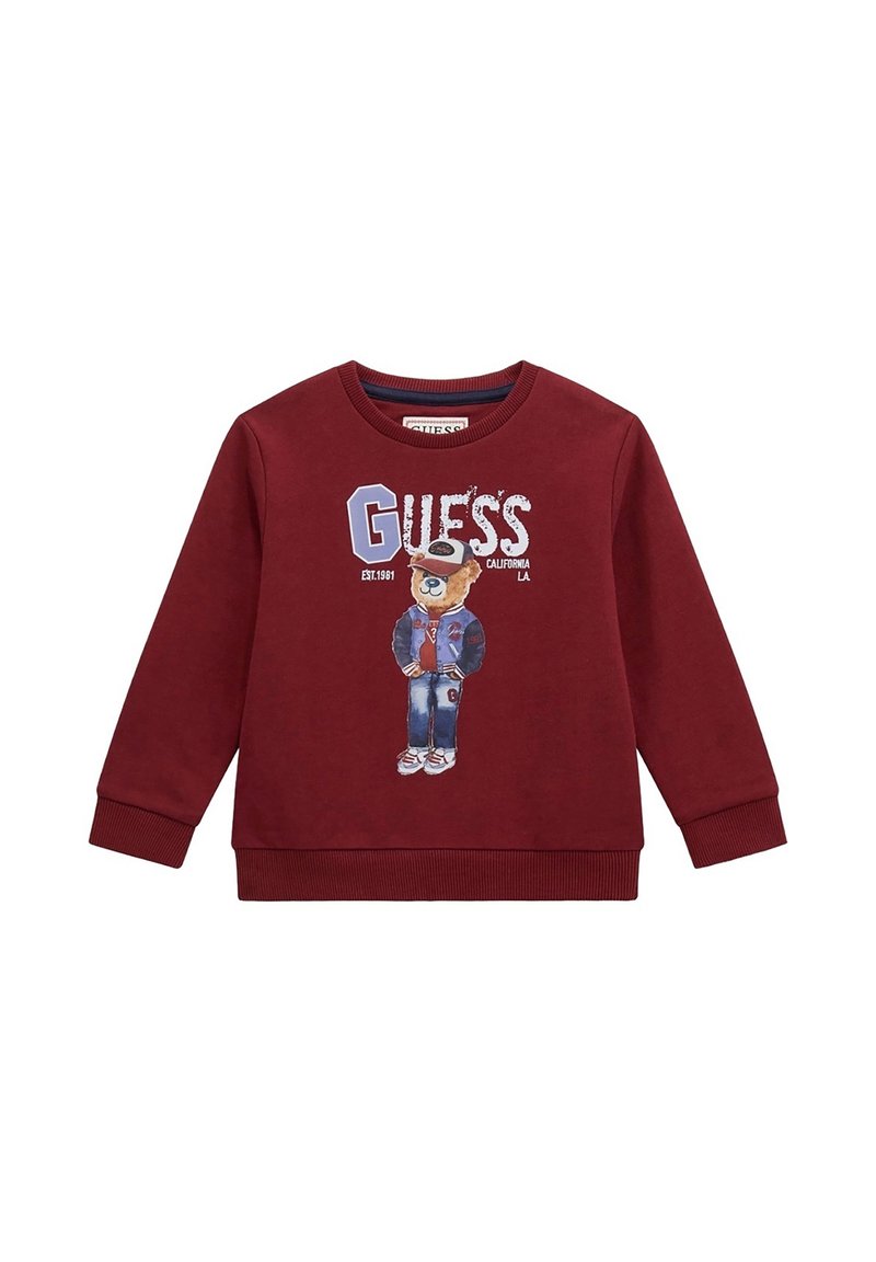 Felpa bordeaux con maniche lunghe, polsini e scollatura a coste; presenta una grafica di un orso che indossa un giubbotto, accompagnata dal testo "GUESS".