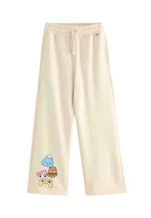 Jasnobeżowe spodnie dresowe z elastycznym pasem, ozdobione zabawnymi grafikami z kreskówek: górą, burgerem i kontrolerem do gier na lewej nogawce.