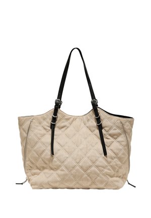 Beige quiltet tote-taske med to sorte justerbare skulderremme og sidelommer med lynlåsdetaljer.