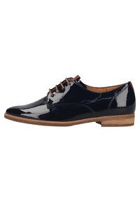 Chaussure oxford noire brillante à lacets avec une semelle et un talon marron clair, ainsi que des lacets et des accents de bordure marron assortis.