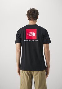 The North Face - TEE - T-shirt med print - black Miniatyrbild 1