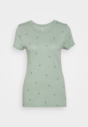 Hellgrünes T-Shirt mit kurzen Ärmeln und kleinen dunkelgrünen Palmenmustern, die über den Stoff verteilt sind, Rundhalsausschnitt und figurbetonter Schnitt.