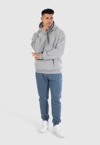 Smilodox CASUAL SPORT FIERO - Trainingsbroek - blau