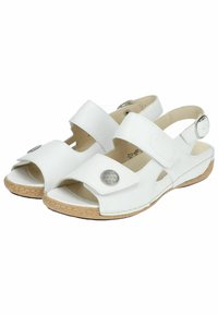 Sandales en cuir blanc avec deux sangles réglables, un accent en bouton métallique rond et une semelle à texture de liège pour une meilleure adhérence.
