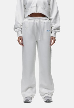 Witte katoenen sweatpants met een relaxte pasvorm, elastische tailleband en verstelbare koord. Kenmerkt subtiele blauwe logo-geborduurde details aan de zijkant.