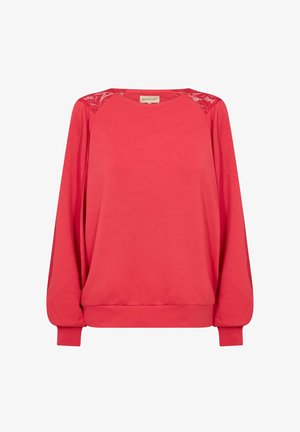 Crvena dukserica dugih rukava s čipkastim detaljima na ramenima, rebrastim manžetama i rubom. Mekan materijal, opušteni kroj, okrugli izrez.