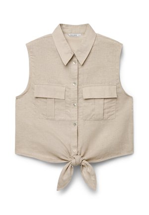 Haut court beige sans manches à boutons avec col, deux poches avant à rabat et nœud noué à la taille.